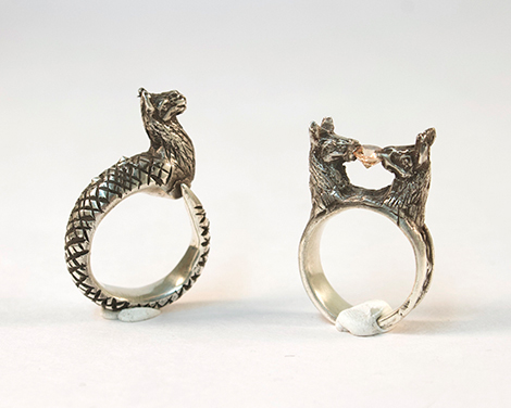 two silver dragon rings
