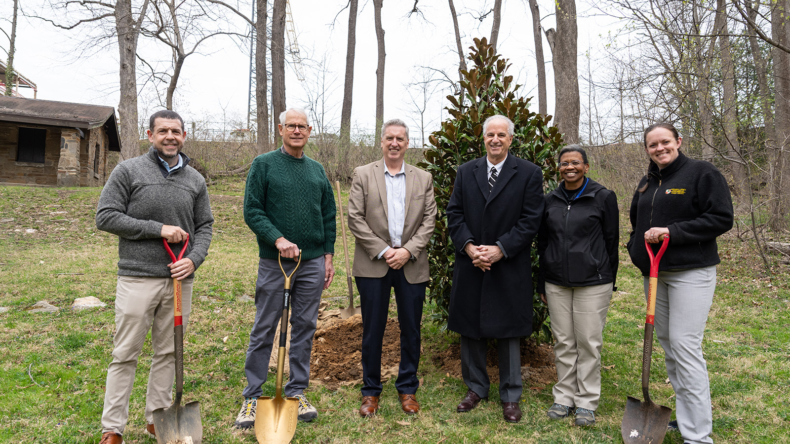 Dr. Hull with group faculty and staff at Arbor Day celebration